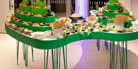 an exciting buffet layout using multiple levels on a green sctructure