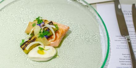 fish starter plated on a flat glass plate